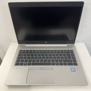 An HP EliteBook 840 G5 | Intel Core i5 laptop with a silver body and black screen is open on a white surface, displaying its keyboard and touchpad.