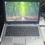 HP EliteBook 840 G1 laptop with 14-inch HD display, Intel Core i5, 8GB RAM, and 1TB SSD – front and side view