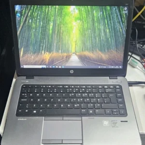 HP EliteBook 840 G1 laptop with 14-inch HD display, Intel Core i5, 8GB RAM, and 1TB SSD – front and side view