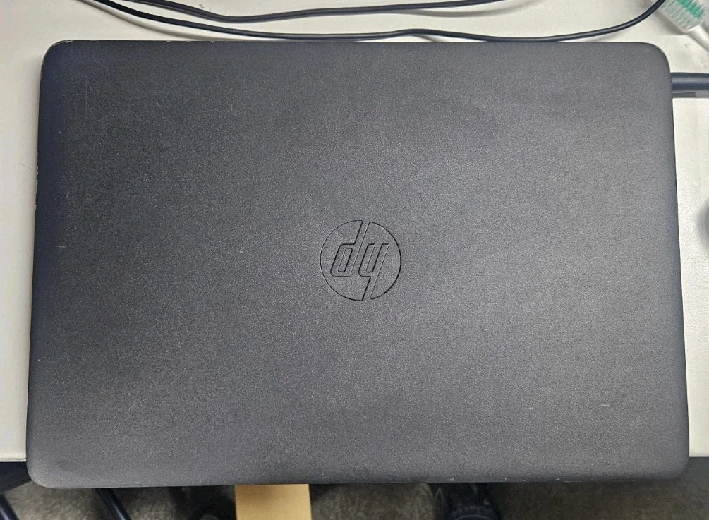 HP EliteBook 840 G1 laptop with 14-inch HD display, Intel Core i5, 8GB RAM, and 1TB SSD – front and side view