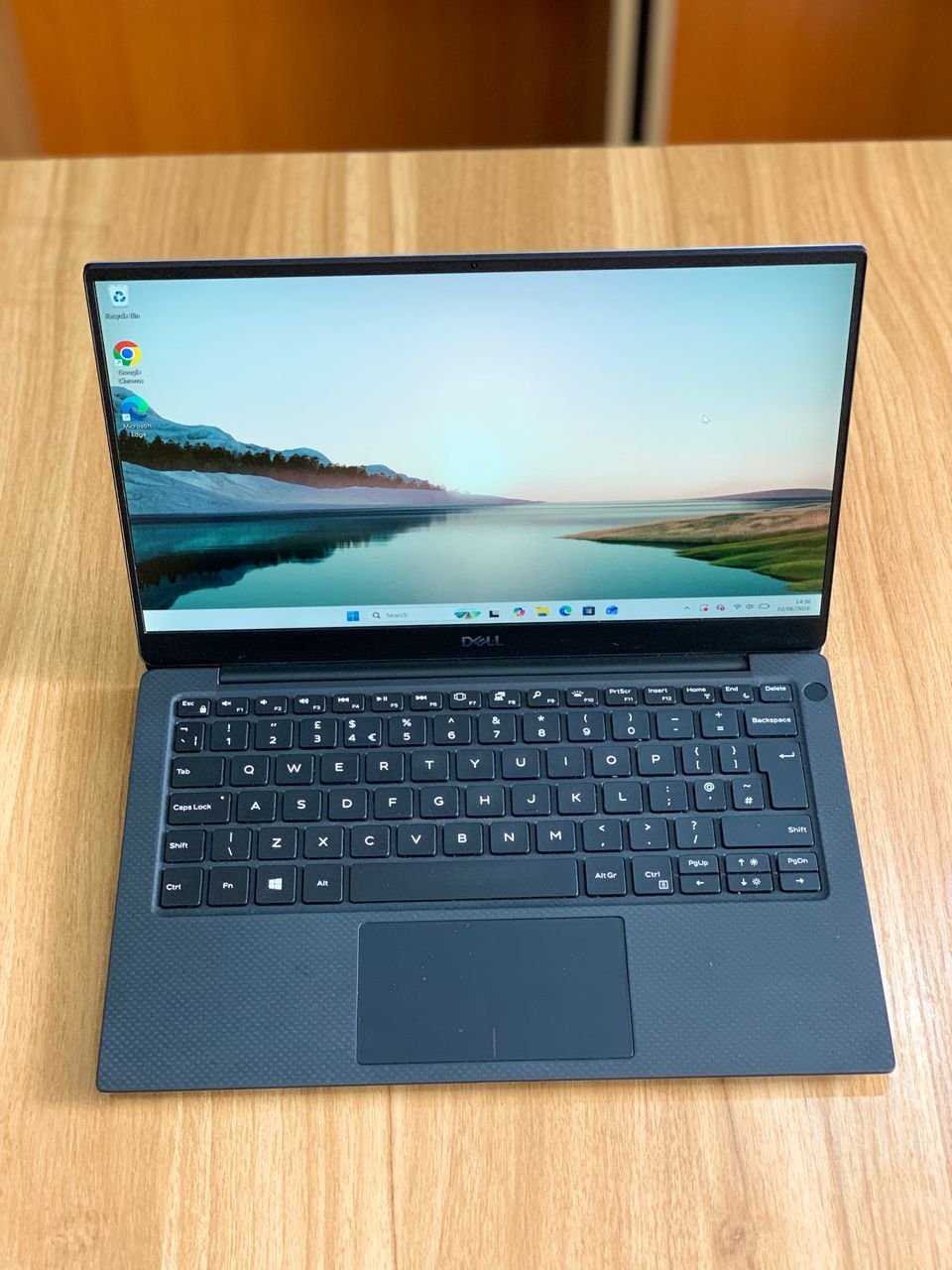 Dell XPS 13 7390 laptop with Intel Core i5 10th Gen, 8GB RAM, and 256GB NVMe SSD