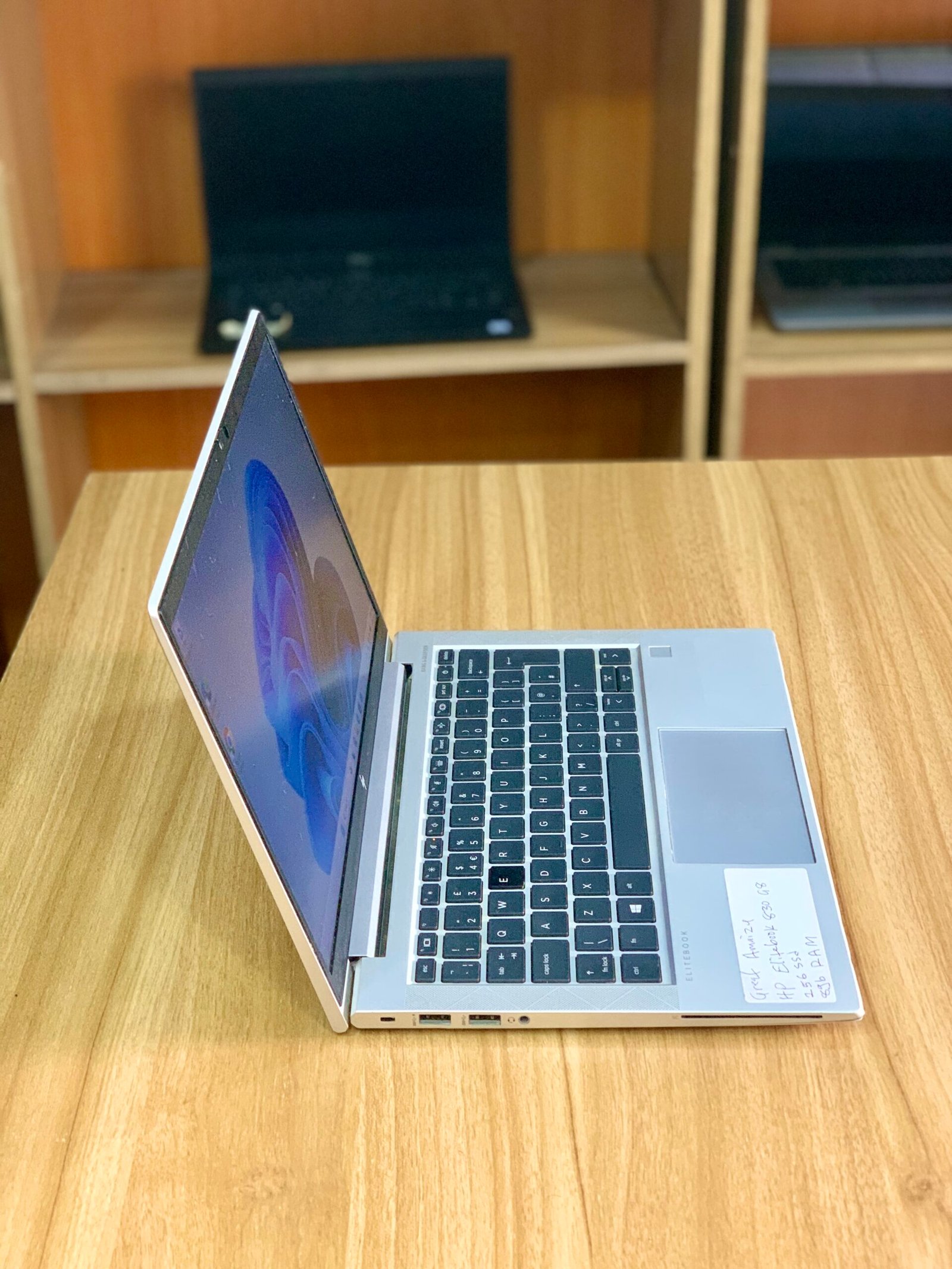 HP EliteBook 830 G8 laptop with Intel Core i5 11th Gen processor, 8GB RAM, and 256GB SSD