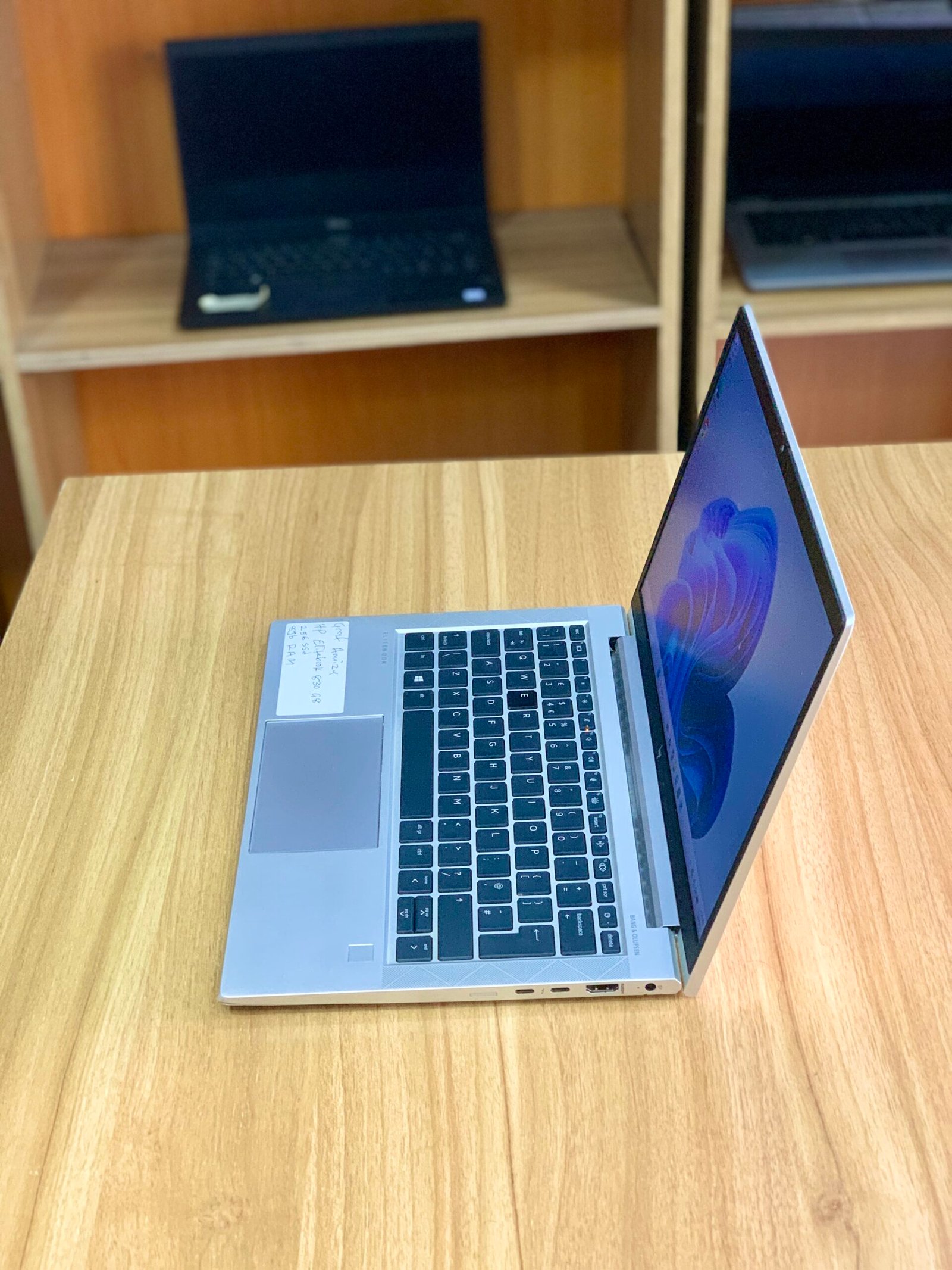 HP EliteBook 830 G8 laptop with Intel Core i5 11th Gen processor, 8GB RAM, and 256GB SSD